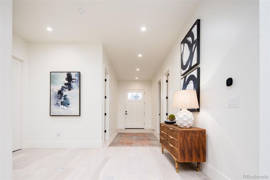 Expansive 7' wide foyer with custom 4'wide x 8' tall entry door