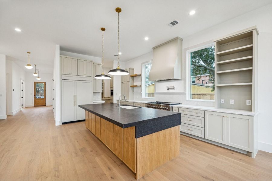 Black pearl quartz on the large kitchen island