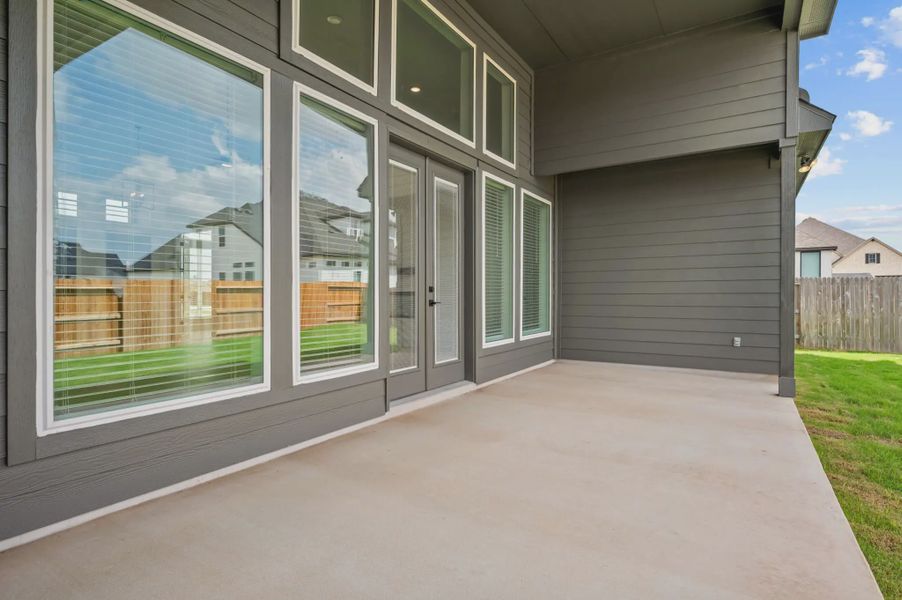 Representative exterior details of a home built from the Ainsley by Chesmar Homes in Heimer Estates at Garden Ridge, Fulshear (Image 4).