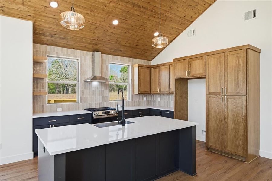 Custom white oak cabinets with floating shelves!