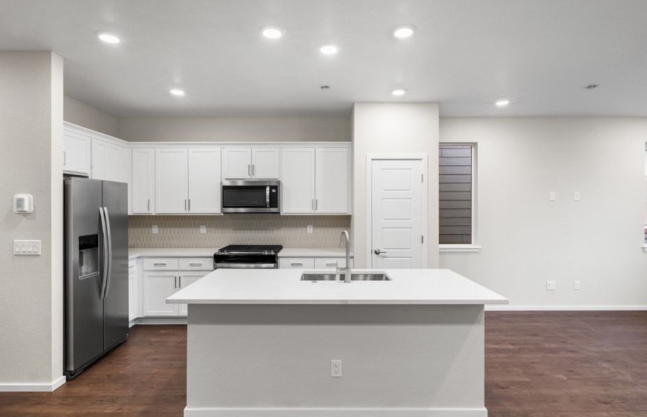 Furnished interior in a model home at Painted Prairie in Aurora (Image 10).