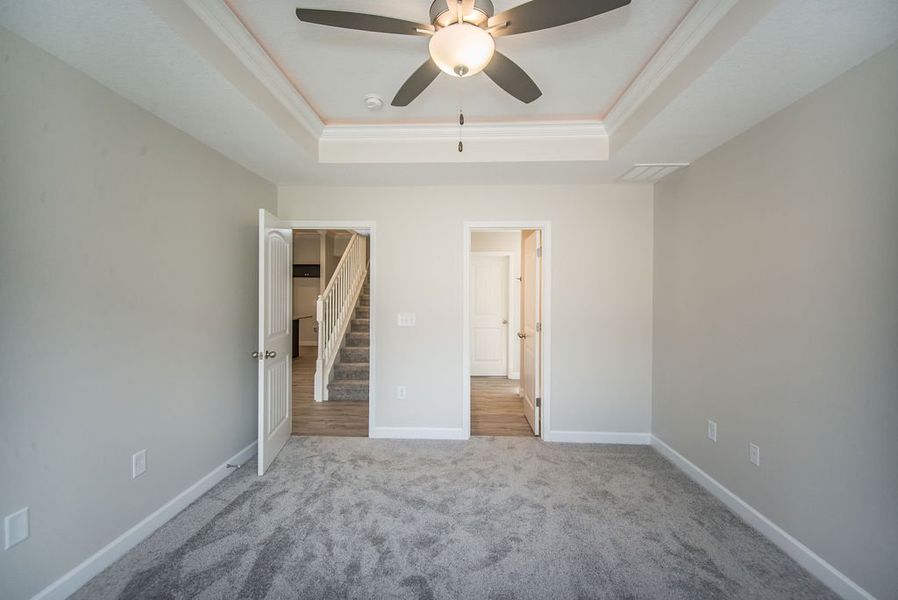 Representative unfurnished interior of a home built from the Quincy by Enchanted Homes in Lonesome Dove, San Antonio (Image 38).