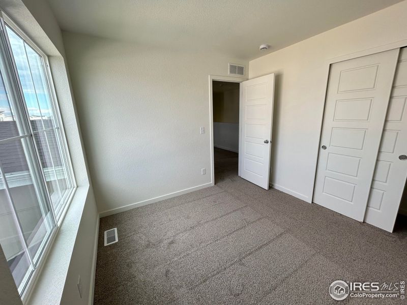 Spacious, unfurnished interior of a new home in Liberty Draw, Evans (Image 12).