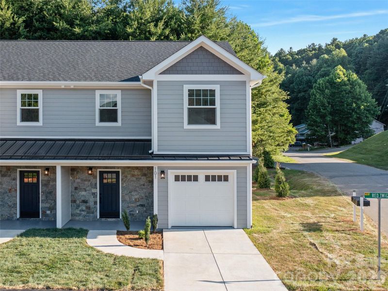 Front exterior of a new home in , Burnsville, NC, highlighting curb appeal (Image 26). Front exterior of a new home in , Burnsville, NC, highlighting curb appeal (Image 26).
