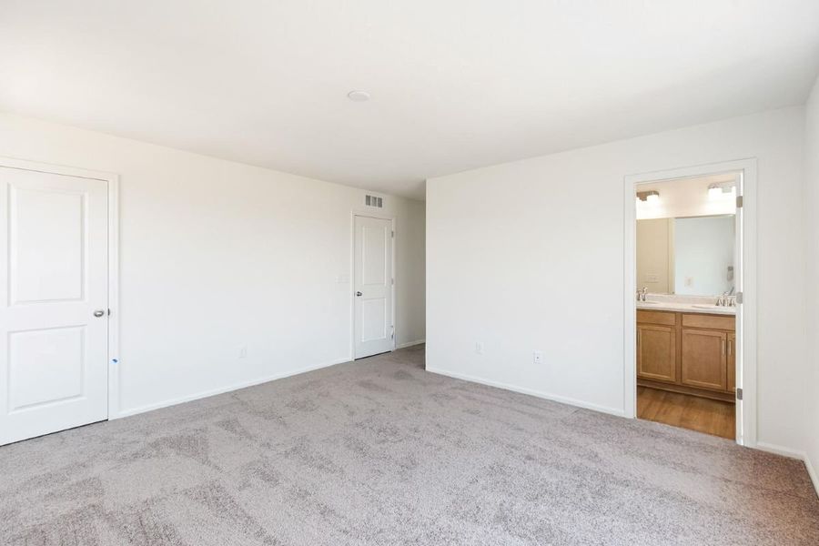 Spacious, unfurnished interior of a new home in Sky Ranch Villas, Watkins (Image 19).