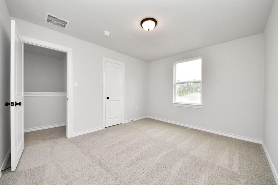 Spacious, unfurnished interior of a new home in The Enclave at Spring Branch, Montgomery (Image 34).