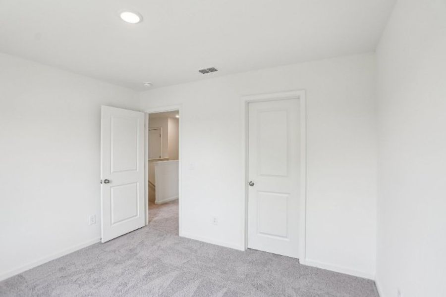 A room with white doors.