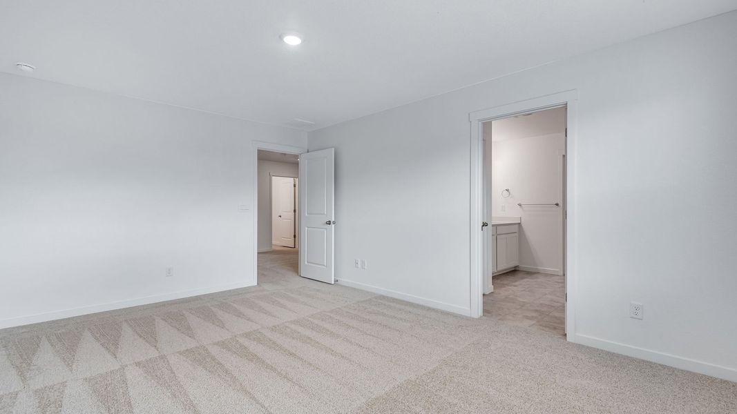 Spacious, unfurnished interior of a new home in Trails at Crowfoot, Parker (Image 21).