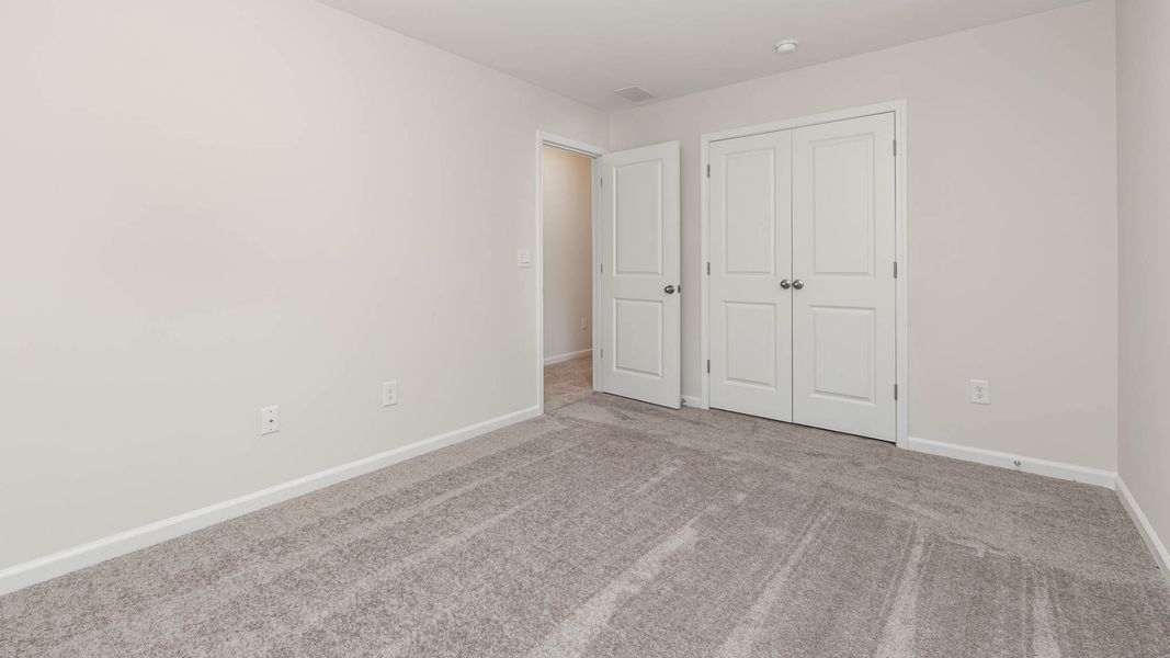 Representative unfurnished interior of a home built from the WREN by D.R. Horton in Cedar Hill Landing, Navassa (Image 29).