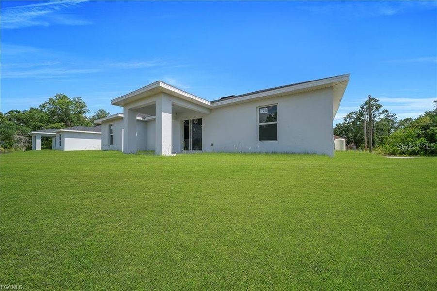 Exterior details and patio area of a home in , Lehigh Acres (Image 20).