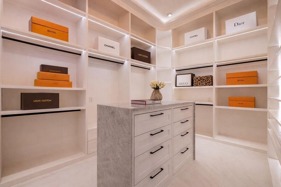 The largest of the two primary closets. The largest of the two primary closets.