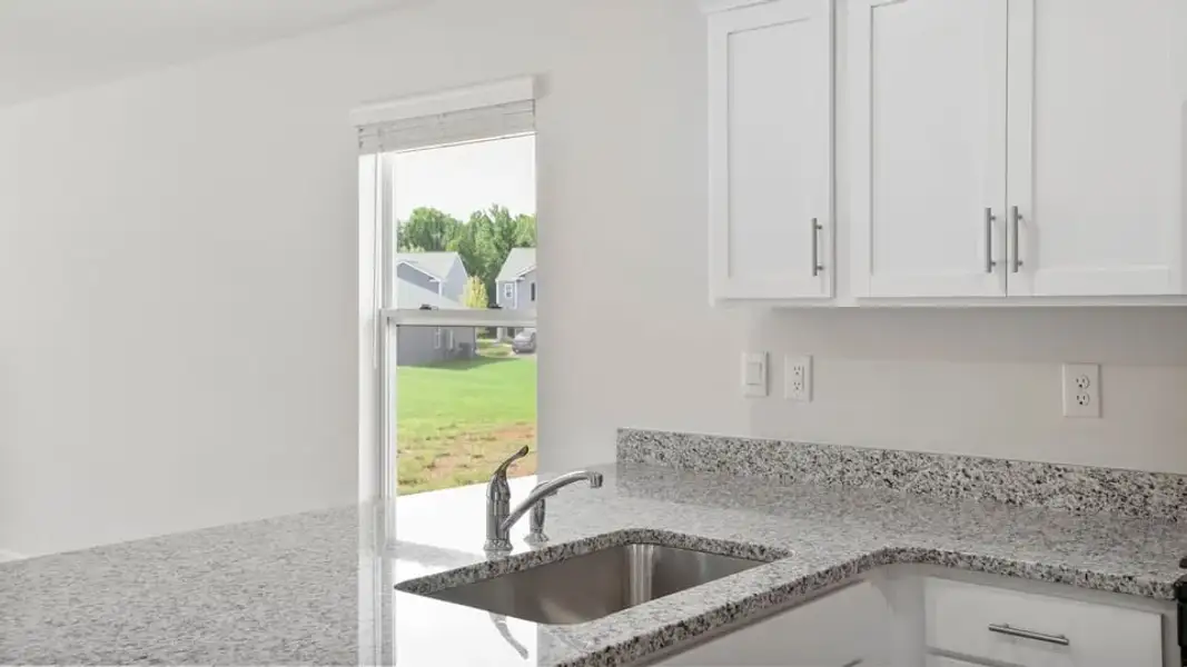 Furnished interior view inside a new home in Village Grove, Greenville (Image 12).