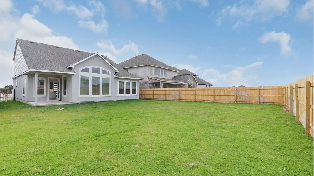 Exterior details and patio area of a home in Santa Rita Ranch, Liberty Hill (Image 4).