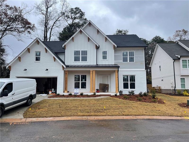 Front exterior of a new home in , Marietta, GA, highlighting curb appeal (Image 1). Front exterior of a new home in , Marietta, GA, highlighting curb appeal (Image 1).