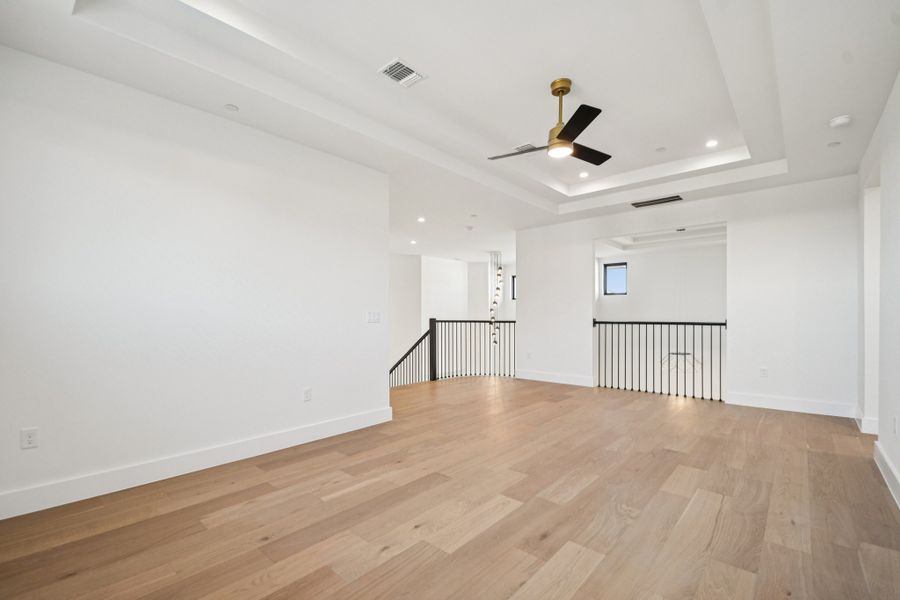 Spacious, unfurnished interior of a new home in Milky Way at River Place, Austin (Image 24).