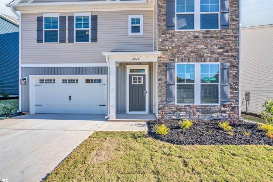 Exterior details and patio area of a home in Halton Oaks, Spartanburg (Image 3).