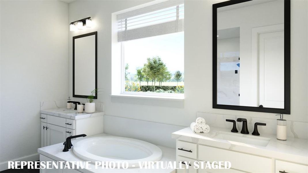 With his and her vanities, there is plenty of room for 2 in this lovely owner's bath.  VIRTUALLY STAGED RENDERING