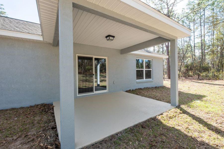 Exterior details and patio area of a home in , Citrus Springs (Image 26).