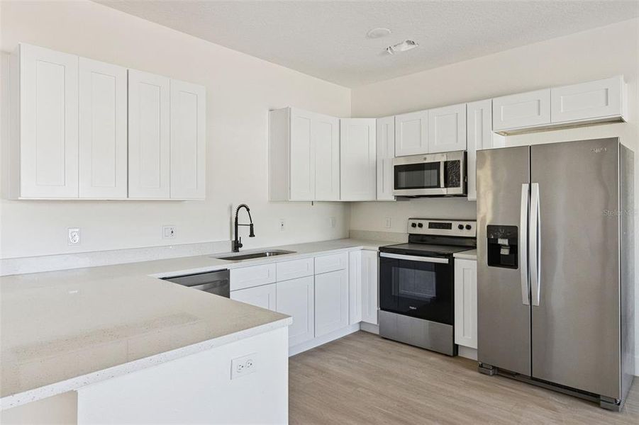 Furnished interior view inside a new home in , Kissimmee (Image 7).