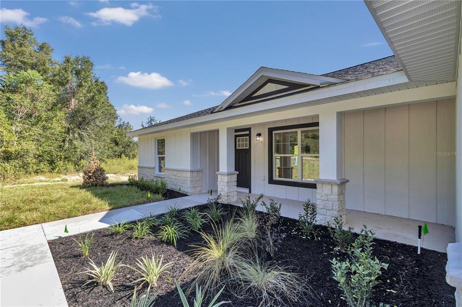 Exterior details and patio area of a home in , Ocala (Image 13).