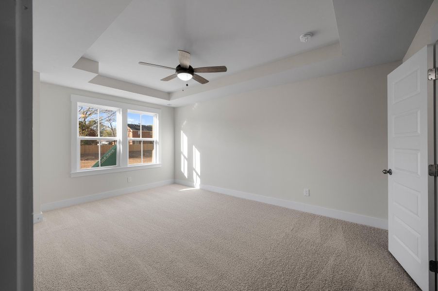 Photo is of a similar home