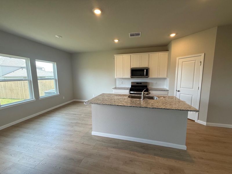 Furnished interior view inside a new home in Midtown Reserve, College Station (Image 6).