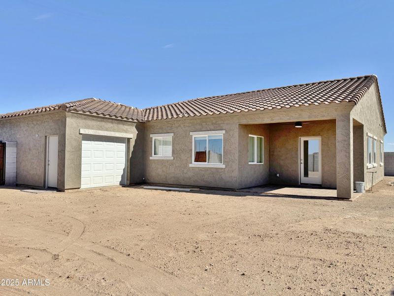 Back of home and garage Back of home and garage