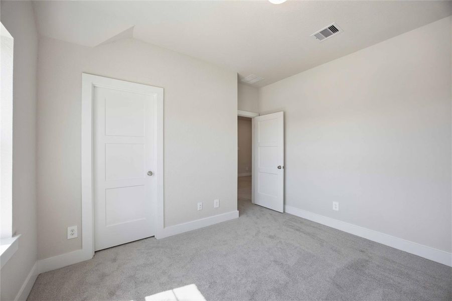 Spacious, unfurnished interior of a new home in Sienna, Missouri City (Image 8). Spacious, unfurnished interior of a new home in Sienna, Missouri City (Image 8).