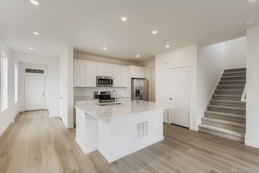 Furnished interior view inside a new home in Parterre, Thornton (Image 5).