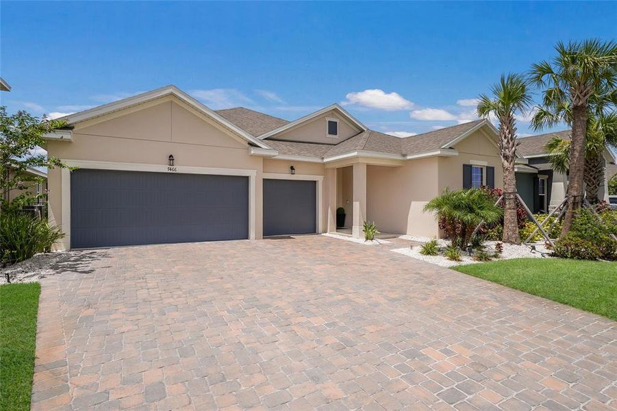 Front exterior of a new home in Seaire, Parrish, FL, highlighting curb appeal (Image 2). Front exterior of a new home in Seaire, Parrish, FL, highlighting curb appeal (Image 2).