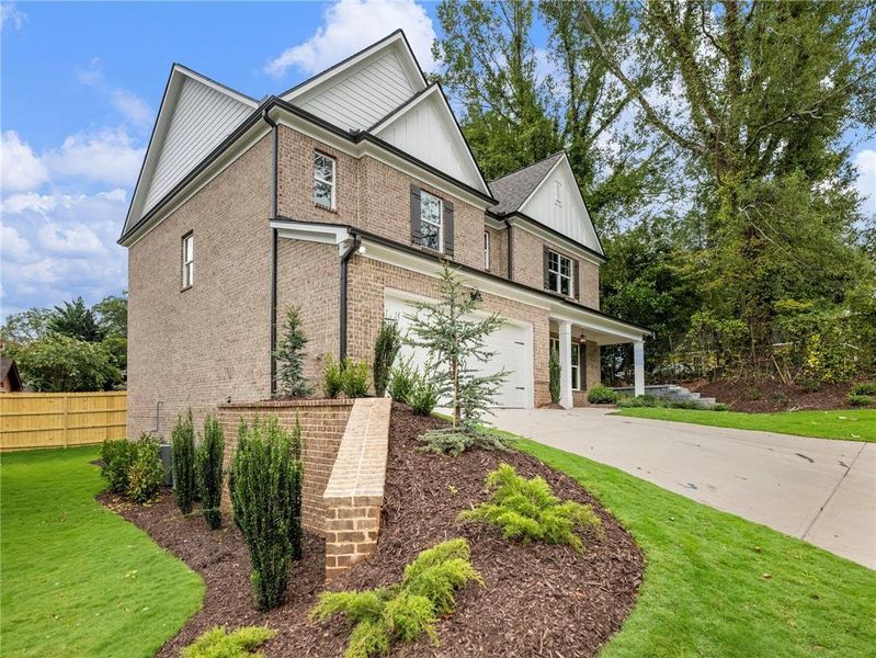 Front exterior of a new home in , Buford, GA, highlighting curb appeal (Image 1). Front exterior of a new home in , Buford, GA, highlighting curb appeal (Image 1).