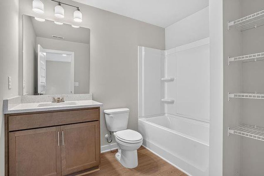 Furnished interior view inside a new home in The Cottages at East Lanier, Fayetteville (Image 8).