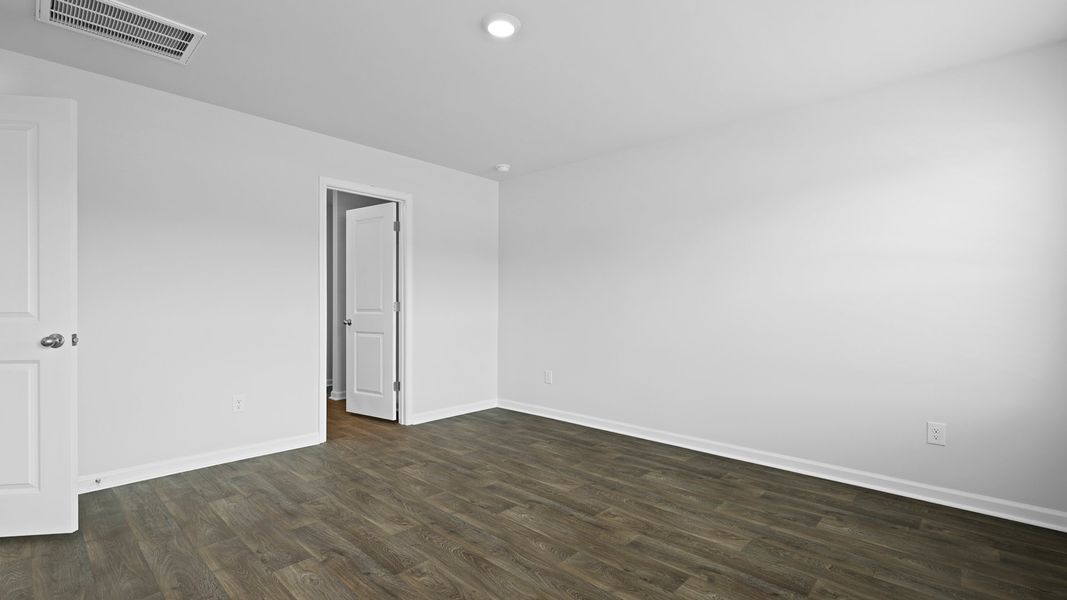 Representative unfurnished interior of a home built from the MURRAY TH by D.R. Horton in Pine Hills Townhomes at Cane Bay, Summerville (Image 23).