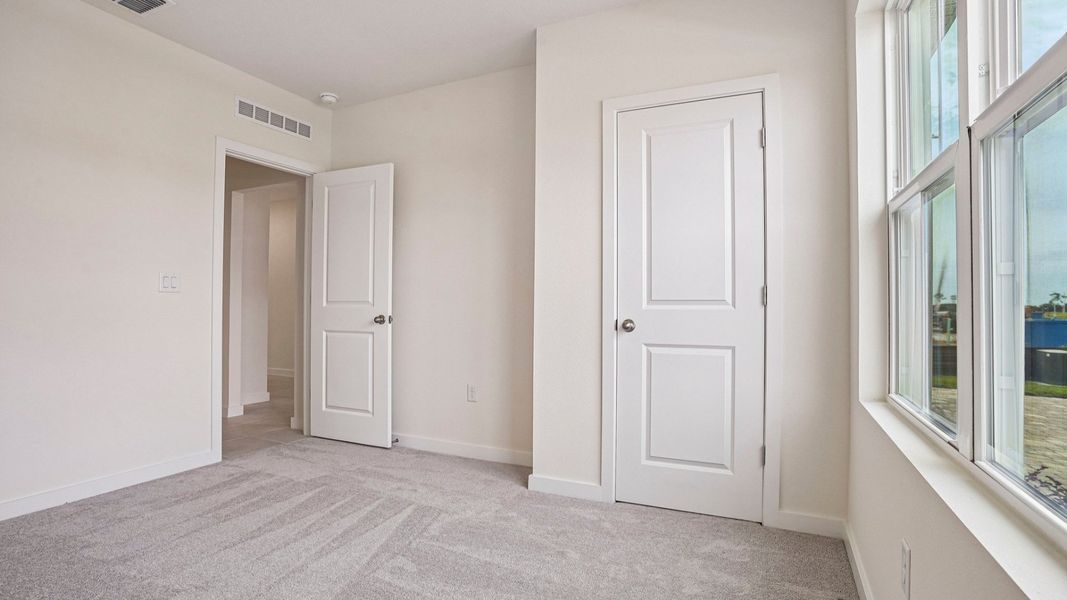 Furnished interior view inside a new home in Willowbrook North, Winter Haven (Image 31).