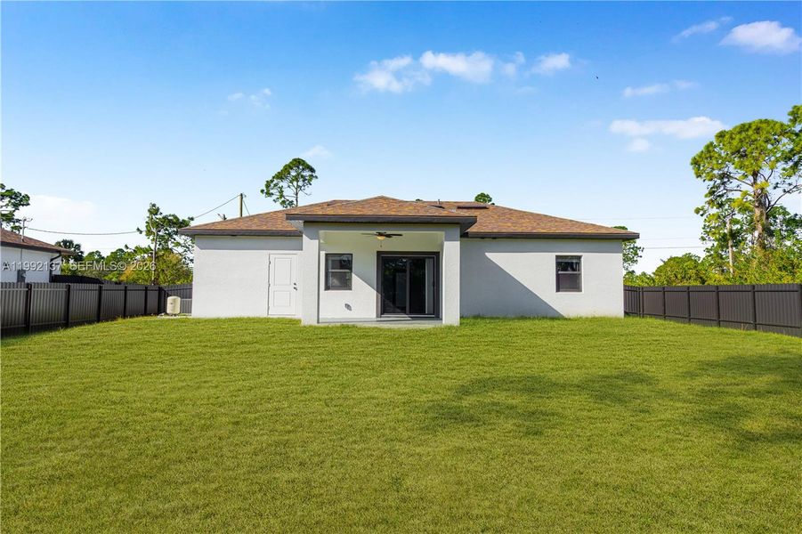 Exterior details and patio area of a home in , Lehigh Acres (Image 21). Exterior details and patio area of a home in , Lehigh Acres (Image 21).