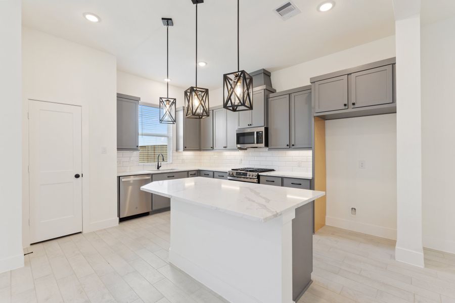 Furnished interior view inside a new home in Meridiana, Manvel (Image 14).