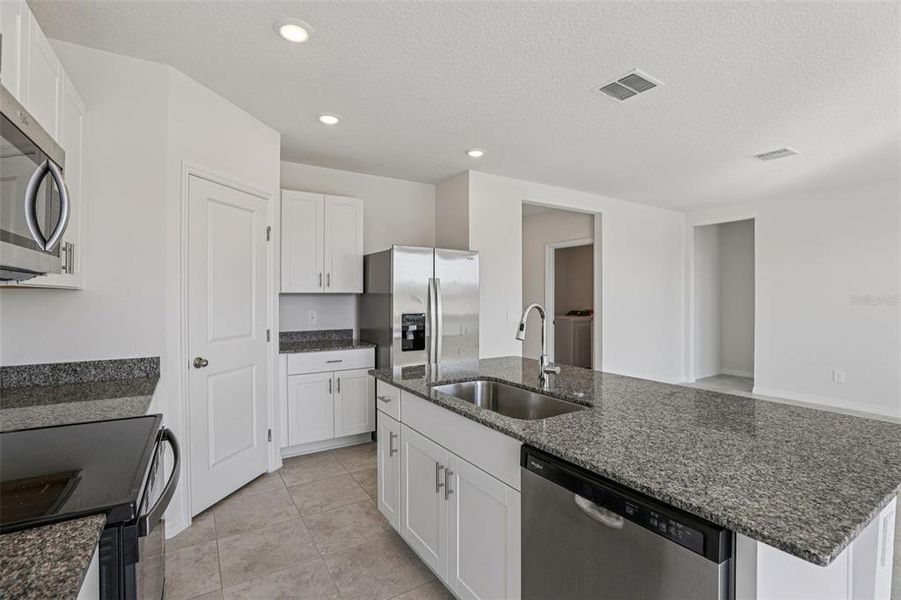 Furnished interior view inside a new home in Crosswinds - Signature Series, Haines City (Image 6).