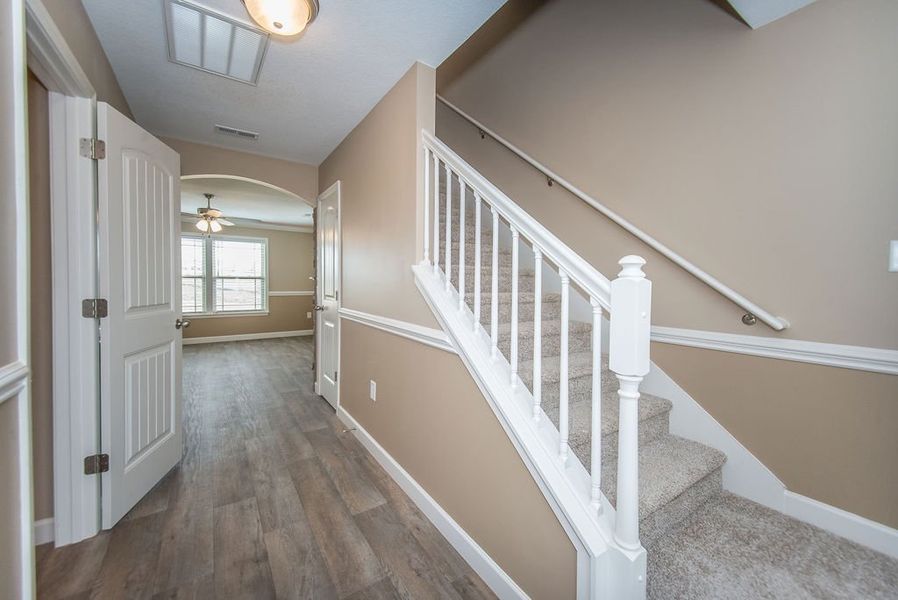 Representative unfurnished interior of a home built from the Reynolds by Enchanted Homes in Arcadia Village, Spartanburg (Image 28).