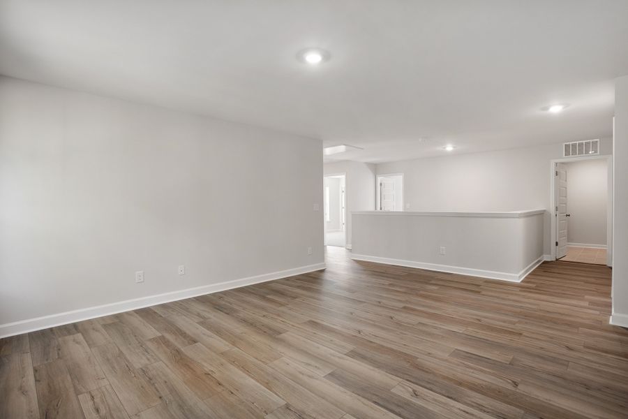 Spacious, unfurnished interior of a new home in Georgias Landing, Raleigh (Image 30).