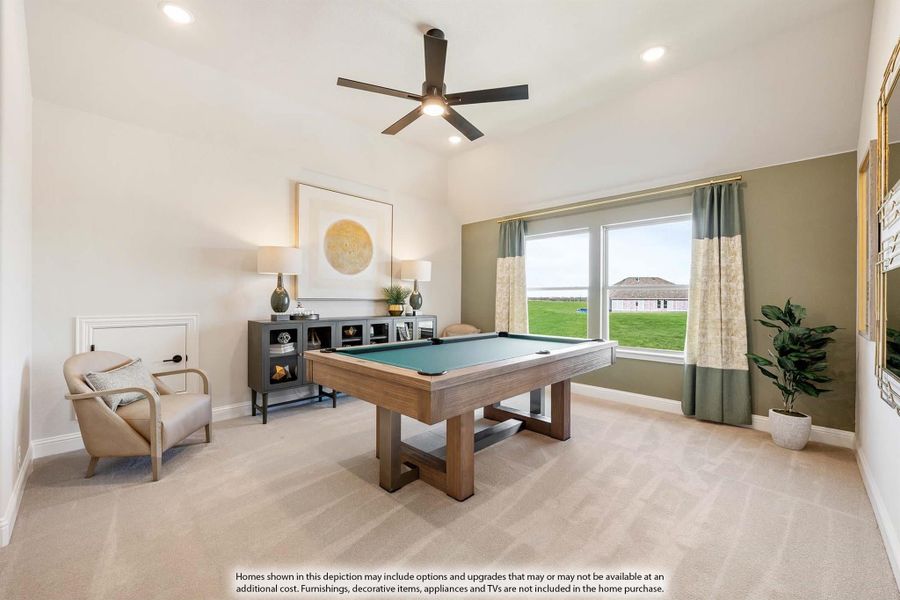 Game room with pool table, ceiling fan, carpet flooring, and large window with backyard view