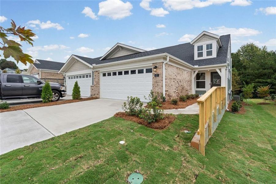 Front exterior of a new home in Villas at Gold Creek, Dawsonville, GA, highlighting curb appeal (Image 19).