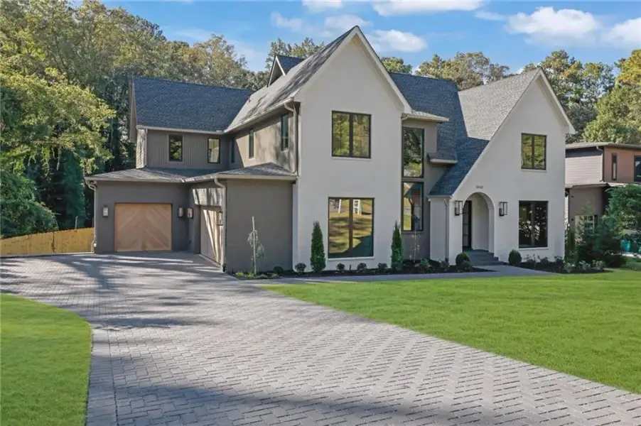 Front exterior of a new home in , Sandy Springs, GA, highlighting curb appeal (Image 30).