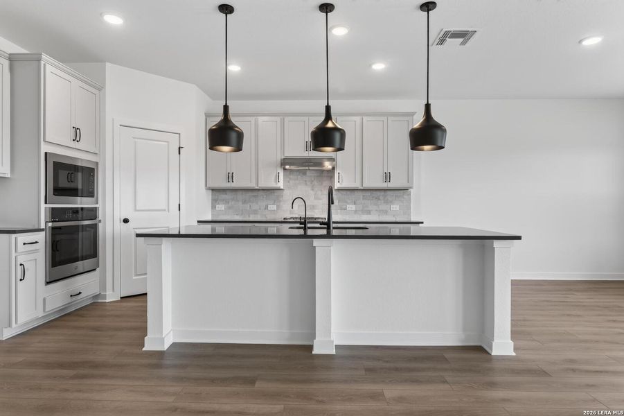 Furnished interior view inside a new home in Nopal Valley, San Antonio (Image 7).