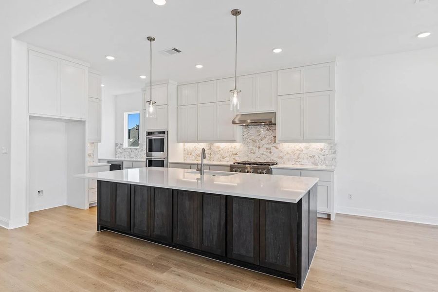Furnished interior view inside a new home in Wolf Ranch West Bend - 60', Georgetown (Image 17).