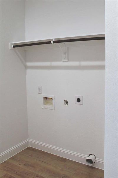 Laundry room featuring full-size connections. Laundry room featuring full-size connections.