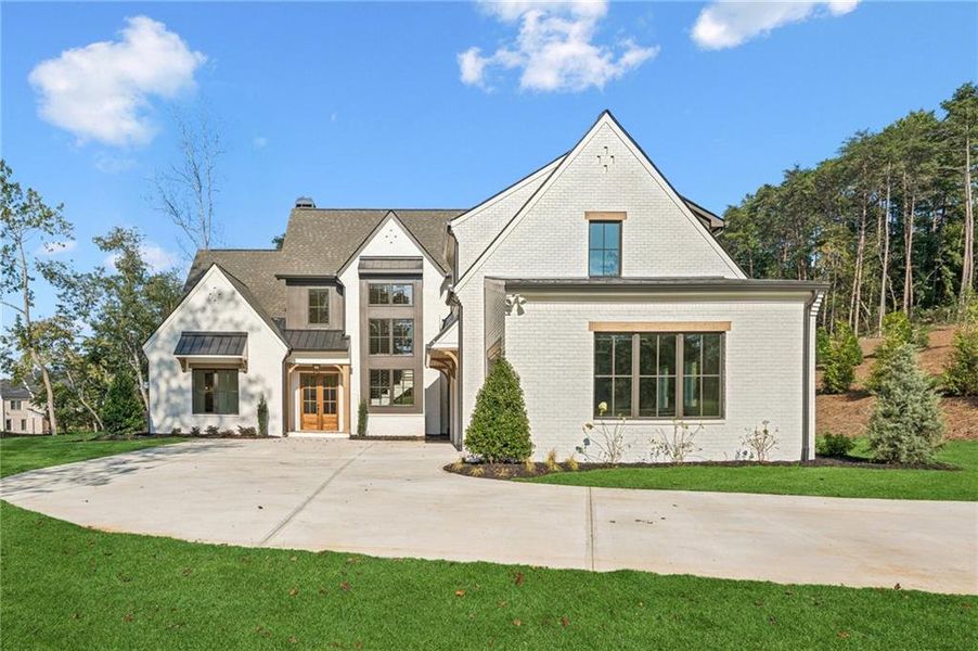 Front exterior of a new home in , Cumming, GA, highlighting curb appeal (Image 2).