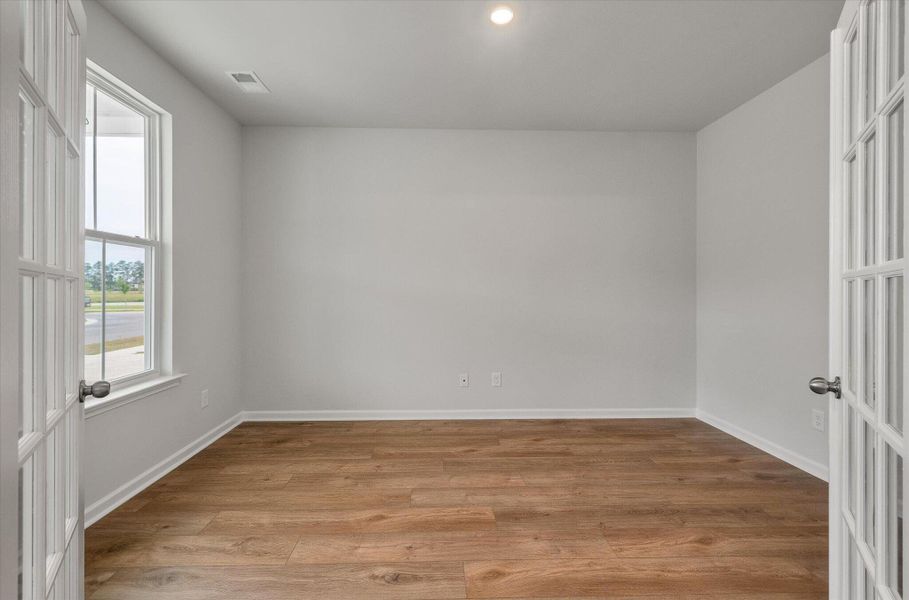 Spacious, unfurnished interior of a new home in Sweetgrass at Summers Corner, Summerville (Image 39).