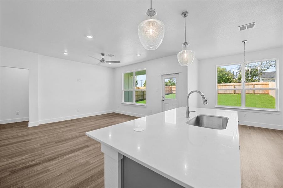 Please Note: These interior photos are not of the actual home but are of a completed one with a similar floor plan. Finishes, features, and layouts may vary.