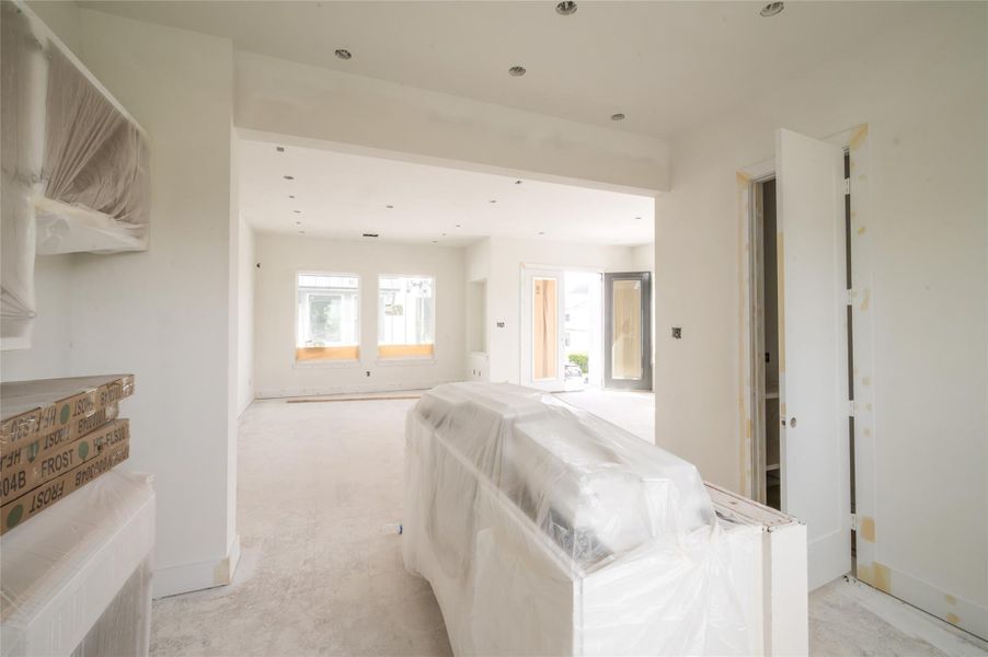 View from the kitchen into the family room. View from the kitchen into the family room.