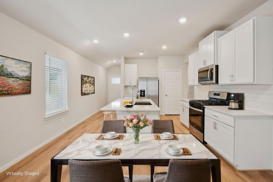 Furnished interior view inside a new home in Granger Pointe - Traditional Series, Conroe (Image 8).
